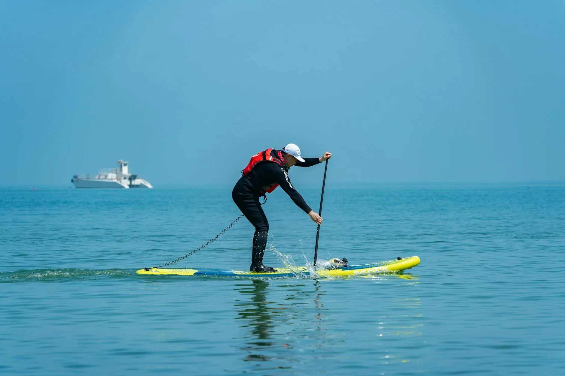 Dog sitting on a boat during an outdoor water adventure